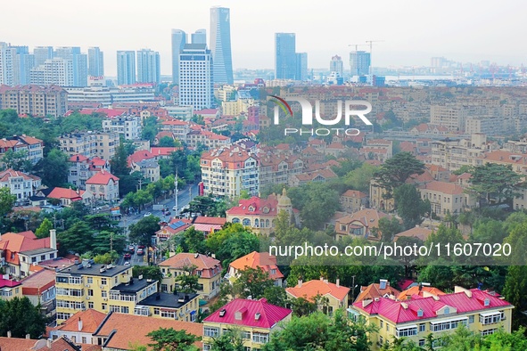 A photo taken on August 30, 2024, shows the distinctive urban buildings in Qingdao, China. On September 24, 2024, the State Council Informat...