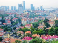 A photo taken on August 30, 2024, shows the distinctive urban buildings in Qingdao, China. On September 24, 2024, the State Council Informat...