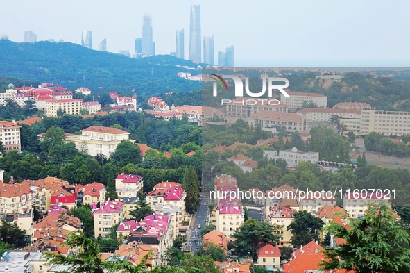 A photo taken on August 30, 2024, shows the distinctive urban buildings in Qingdao, China. On September 24, 2024, the State Council Informat...