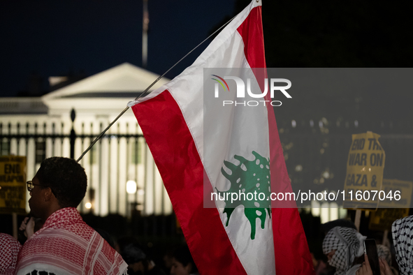 People demonstrate in front of the White House in support of Lebanon, following extensive air strikes by Israel, in Washington, DC, on Septe...