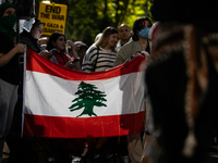 People demonstrate in front of the White House in support of Lebanon, following extensive air strikes by Israel, in Washington, DC, on Septe...