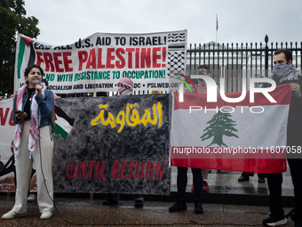 People demonstrate in front of the White House in support of Lebanon, following extensive air strikes by Israel, in Washington, DC, on Septe...