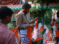 Indian National Congress workers install party flags ahead of Rahul Gandhi's visit to Sopore, Jammu and Kashmir, India, on September 25, 202...