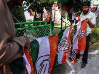 Indian National Congress workers install party flags ahead of Rahul Gandhi's visit to Sopore, Jammu and Kashmir, India, on September 25, 202...