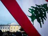 Protesters hold a demonstration in front of the White House in support of Lebanon following extensive air strikes by Israel, in Washington,...