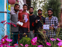 People wait to cast their votes in the second phase of Assembly elections in Beerwah, Jammu and Kashmir, India, on September 25, 2024 (