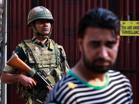 People wait to cast their votes in the second phase of Assembly elections in Beerwah, Jammu and Kashmir, India, on September 25, 2024 (