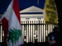 People demonstrate in front of the White House in support of Lebanon, following extensive air strikes by Israel, in Washington, DC, on Septe...