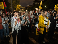 People demonstrate in front of the White House in support of Lebanon, following extensive air strikes by Israel, in Washington, DC, on Septe...