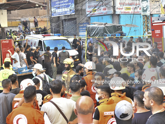 Lebanese security forces take security measures in the area after an Israeli airstrike in Beirut, Lebanon, on September 24, 2024. Six people...