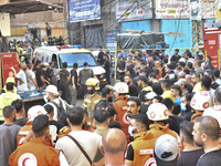 Lebanese security forces take security measures in the area after an Israeli airstrike in Beirut, Lebanon, on September 24, 2024. Six people...