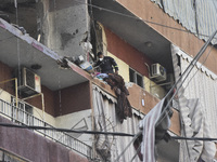 Lebanese security forces take security measures in the area after an Israeli airstrike in Beirut, Lebanon, on September 24, 2024. Six people...