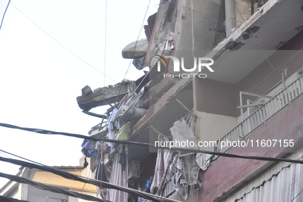 Lebanese security forces take security measures in the area after an Israeli airstrike in Beirut, Lebanon, on September 24, 2024. Six people...