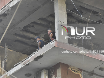 Lebanese security forces take security measures in the area after an Israeli airstrike in Beirut, Lebanon, on September 24, 2024. Six people...