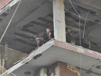 Lebanese security forces take security measures in the area after an Israeli airstrike in Beirut, Lebanon, on September 24, 2024. Six people...