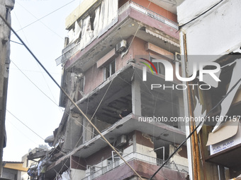 Lebanese security forces take security measures in the area after an Israeli airstrike in Beirut, Lebanon, on September 24, 2024. Six people...