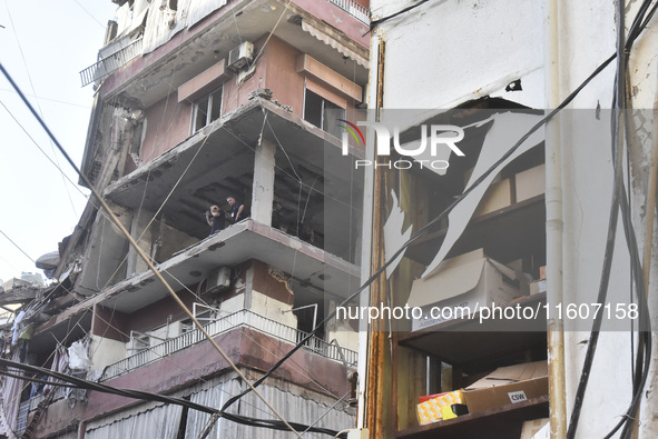 Lebanese security forces take security measures in the area after an Israeli airstrike in Beirut, Lebanon, on September 24, 2024. Six people...