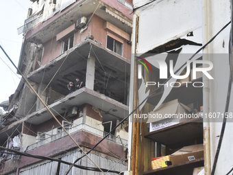 Lebanese security forces take security measures in the area after an Israeli airstrike in Beirut, Lebanon, on September 24, 2024. Six people...