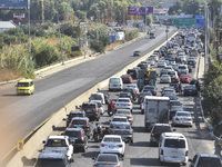 Lebanese people forced to flee their homes due to Israeli airstrikes migrate with what they can take with them to Saida, Lebanon, on Septemb...