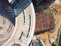 Workers step up construction at the project construction site of Big Data Industrial Park in Yuexi County, Anqing, China, on September 25, 2...