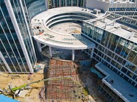 Workers step up construction at the project construction site of Big Data Industrial Park in Yuexi County, Anqing, China, on September 25, 2...