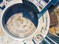 Workers step up construction at the project construction site of Big Data Industrial Park in Yuexi County, Anqing, China, on September 25, 2...