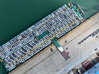 Roll-on wheels load export vehicles at the terminal of the Oriental Port Branch of Lianyungang Port in Lianyungang, China, on September 25,...