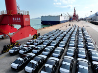 Roll-on wheels load export vehicles at the terminal of the Oriental Port Branch of Lianyungang Port in Lianyungang, China, on September 25,...