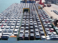 Roll-on wheels load export vehicles at the terminal of the Oriental Port Branch of Lianyungang Port in Lianyungang, China, on September 25,...