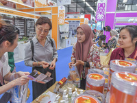 Visitors visit Indonesia's stand at the 21st China-Asean Expo in Nanning, China, on September 25, 2024. (