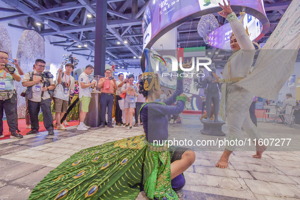 Visitors visit Cambodia's stand at the 21st China-Asean Expo in Nanning, China, on September 25, 2024. 