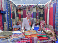 Visitors view Indonesian textile products at the 21st China-Asean Expo in Nanning, China, on September 25, 2024. (