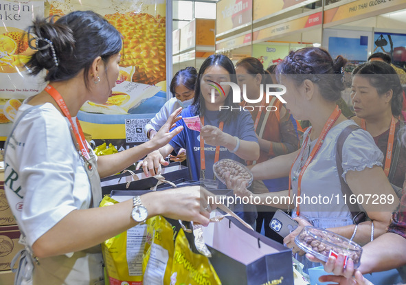 Visitors shop for Vietnamese food at the 21st China-Asean Expo in Nanning, Guangxi Zhuang Autonomous Region, China, on September 25, 2024. 