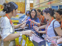 Visitors shop for Vietnamese food at the 21st China-Asean Expo in Nanning, Guangxi Zhuang Autonomous Region, China, on September 25, 2024. (