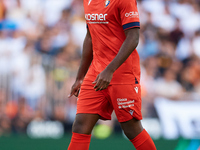 Boyomo of CA Osasuna looks on during the LaLiga EA Sports match between Valencia CF and CA Osasuna at Mestalla stadium in Valencia, Spain, o...