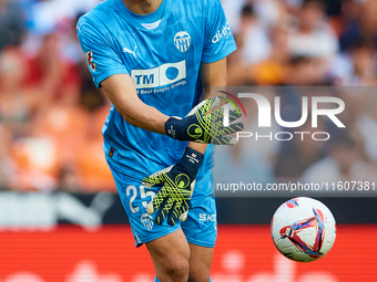 Giorgi Mamardashvili of Valencia CF is in action during the LaLiga EA Sports match between Valencia CF and CA Osasuna at Mestalla stadium in...