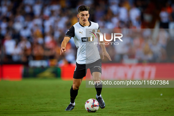 Pepelu of Valencia CF is in action during the LaLiga EA Sports match between Valencia CF and CA Osasuna at Mestalla stadium in Valencia, Spa...