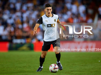 Pepelu of Valencia CF is in action during the LaLiga EA Sports match between Valencia CF and CA Osasuna at Mestalla stadium in Valencia, Spa...