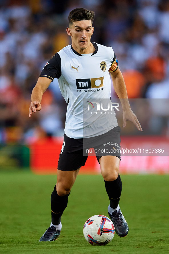 Pepelu of Valencia CF is in action during the LaLiga EA Sports match between Valencia CF and CA Osasuna at Mestalla stadium in Valencia, Spa...