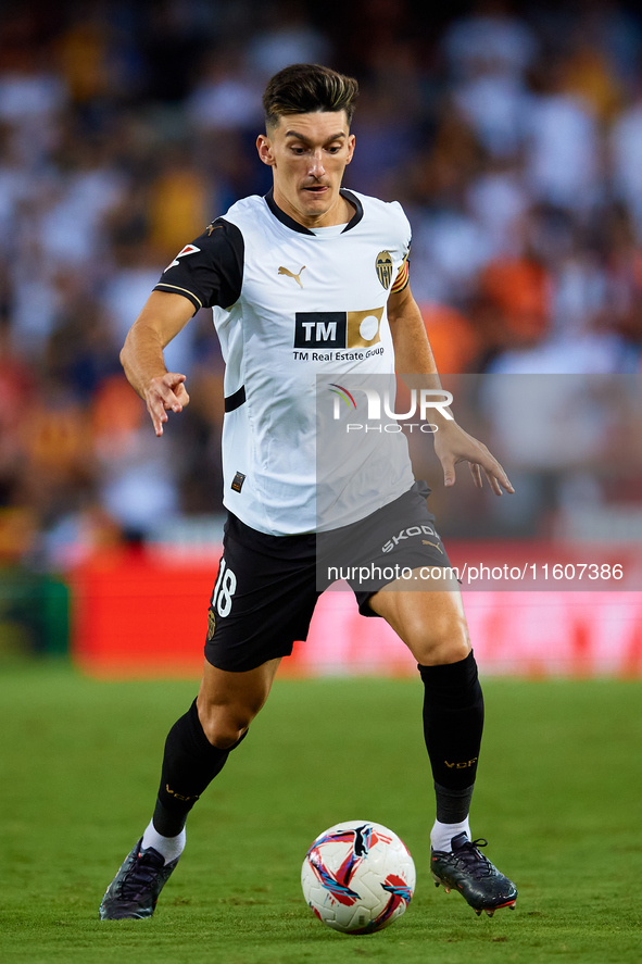 Pepelu of Valencia CF is in action during the LaLiga EA Sports match between Valencia CF and CA Osasuna at Mestalla stadium in Valencia, Spa...