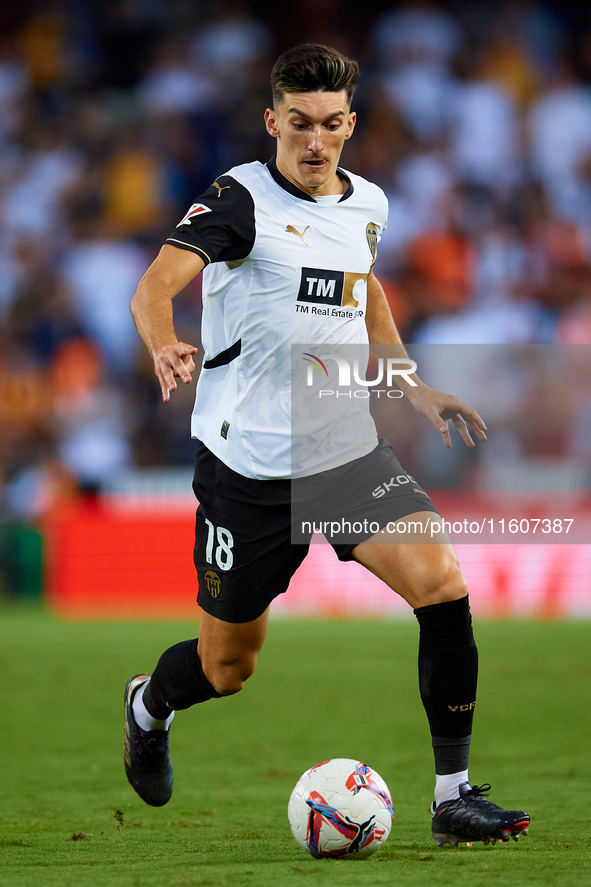 Pepelu of Valencia CF is in action during the LaLiga EA Sports match between Valencia CF and CA Osasuna at Mestalla stadium in Valencia, Spa...