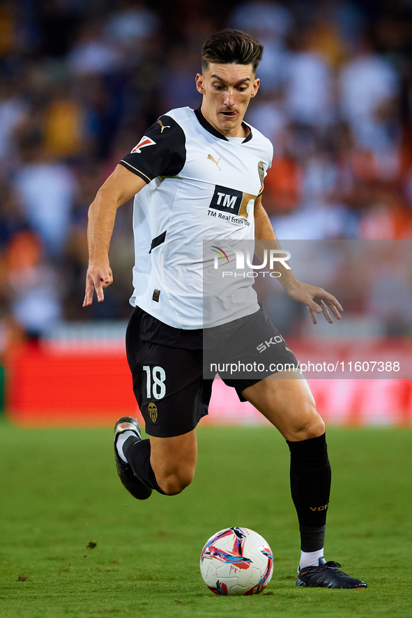 Pepelu of Valencia CF is in action during the LaLiga EA Sports match between Valencia CF and CA Osasuna at Mestalla stadium in Valencia, Spa...