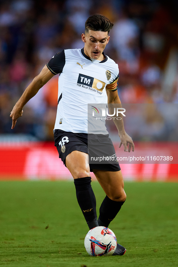 Pepelu of Valencia CF is in action during the LaLiga EA Sports match between Valencia CF and CA Osasuna at Mestalla stadium in Valencia, Spa...