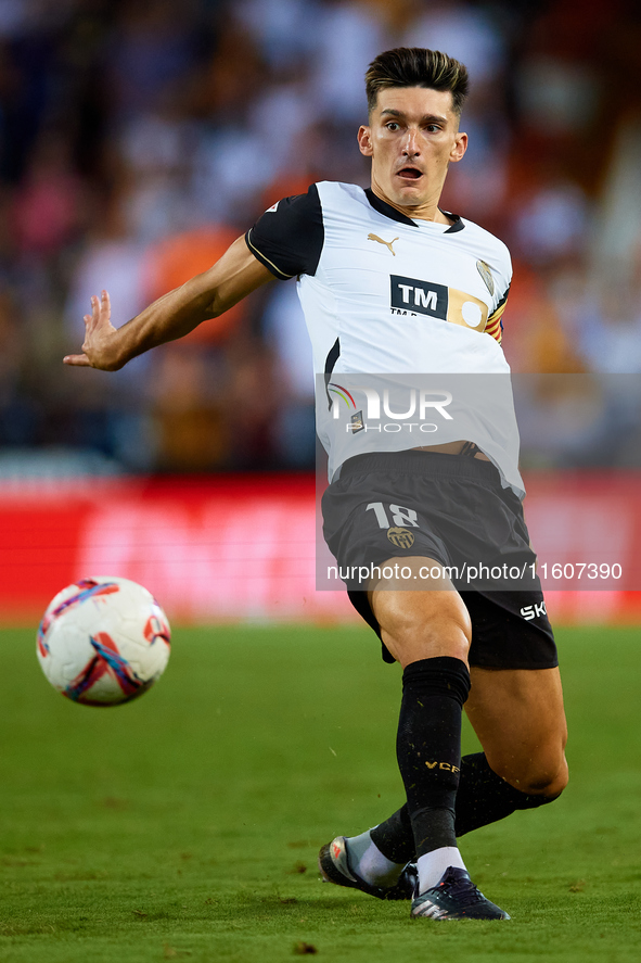 Pepelu of Valencia CF is in action during the LaLiga EA Sports match between Valencia CF and CA Osasuna at Mestalla stadium in Valencia, Spa...