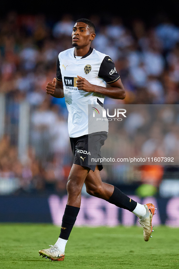 Cristhian Mosquera of Valencia CF runs during the LaLiga EA Sports match between Valencia CF and CA Osasuna at Mestalla stadium in Valencia,...