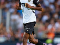 Cristhian Mosquera of Valencia CF runs during the LaLiga EA Sports match between Valencia CF and CA Osasuna at Mestalla stadium in Valencia,...