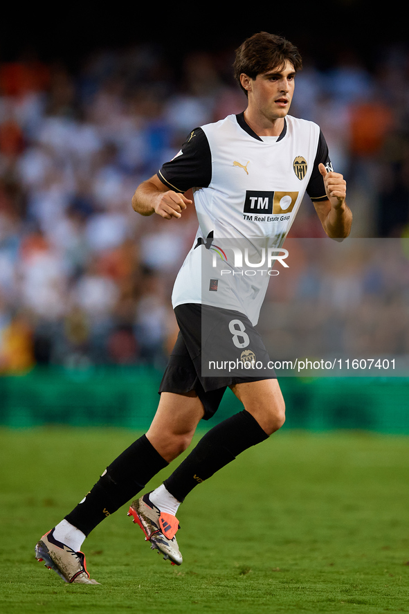 Javi Guerra of Valencia CF runs during the LaLiga EA Sports match between Valencia CF and CA Osasuna at Mestalla stadium in Valencia, Spain,...