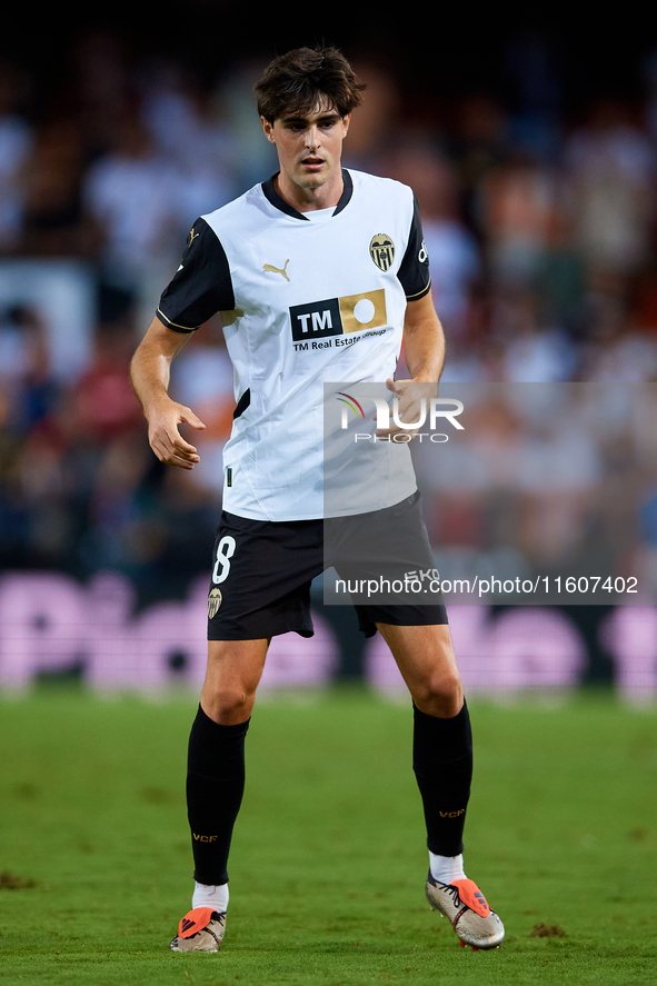 Javi Guerra of Valencia CF is in action during the LaLiga EA Sports match between Valencia CF and CA Osasuna at Mestalla stadium in Valencia...