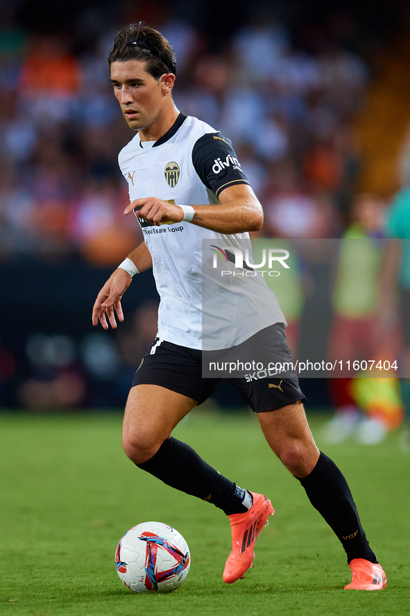 Jesus Vazquez of Valencia CF is in action during the LaLiga EA Sports match between Valencia CF and CA Osasuna at Mestalla stadium in Valenc...