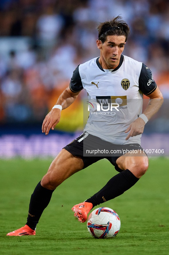 Jesus Vazquez of Valencia CF is in action during the LaLiga EA Sports match between Valencia CF and CA Osasuna at Mestalla stadium in Valenc...